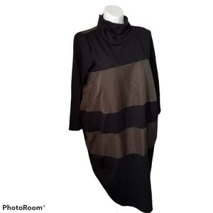 C Yard Dress. Condition is "New with tags".

It do